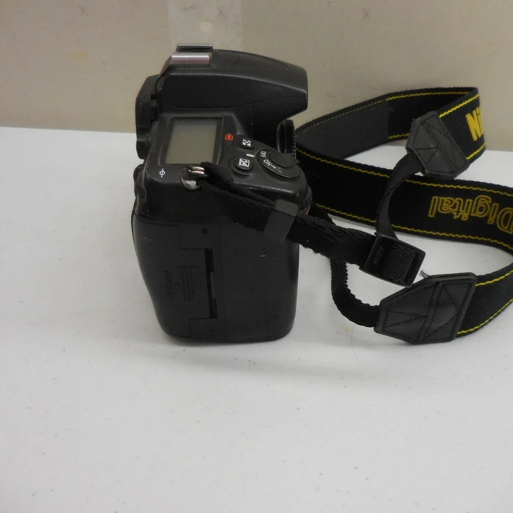 Nikon D7000 Digital SLR Camera Body Black with Battery and Kastar Charger Tested